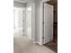 Bright hallway featuring neutral carpet, and white doors leading to other rooms in the home at 329 Brannon Meadows Dr, York, SC 29745