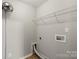 This laundry room features a shelf, utility connections, and linoleum flooring at 329 Brannon Meadows Dr, York, SC 29745