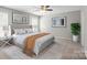 Bedroom featuring a neutral color scheme, ceiling fan, and matching nightstands and wall art at 329 Brannon Meadows Dr, York, SC 29745
