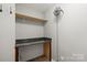 This pantry features a desk and shelf with linoleum flooring and light gray walls at 329 Brannon Meadows Dr, York, SC 29745