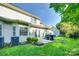 Exterior of home with a small patio and well-maintained lawn at 349 Valley Brook Se Ln, Concord, NC 28025
