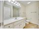 Bright bathroom with a large mirror and shower at 349 Valley Brook Se Ln, Concord, NC 28025