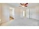 Spacious bedroom with neutral walls and carpet with an ensuite bathroom at 349 Valley Brook Se Ln, Concord, NC 28025