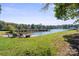 Expansive backyard with a waterfront view and seating, perfect for relaxing and enjoying the scenery at 364 Catalina Dr, Mooresville, NC 28117
