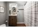 Cozy bathroom with stylish vanity, mirror, and shower with curtain at 364 Catalina Dr, Mooresville, NC 28117