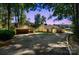 Charming home with a spacious driveway and a detached two-car garage with basketball hoop at 364 Catalina Dr, Mooresville, NC 28117