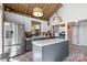 Modern kitchen with stainless steel appliances, custom cabinets, ample counter space, and a kitchen island at 364 Catalina Dr, Mooresville, NC 28117