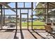 Spacious screened porch offers stunning lake views and outdoor access for relaxation and entertaining at 364 Catalina Dr, Mooresville, NC 28117