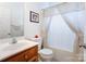 Cozy bathroom with vanity and shower-tub combo at 3874 Willow Grove Ln, Concord, NC 28025