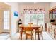 Cozy eat-in area with natural light and wooden table at 3874 Willow Grove Ln, Concord, NC 28025