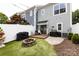 Cozy backyard featuring a fire pit, fenced in privacy, and patio great for relaxation and entertaining at 432 W Worthington Ave, Charlotte, NC 28203
