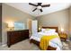 Comfortable bedroom with warm neutral tones, carpet flooring, and ensuite bathroom at 432 W Worthington Ave, Charlotte, NC 28203
