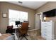 Comfortable and efficient bedroom featuring a functional workspace with a modern desk setup and ample natural light at 432 W Worthington Ave, Charlotte, NC 28203