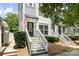 A beautifully landscaped front yard leads to the charming entrance of a well-maintained home at 432 W Worthington Ave, Charlotte, NC 28203
