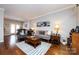 Inviting living room with hardwood floors, stylish furnishings, and an open layout ideal for relaxation and entertainment at 432 W Worthington Ave, Charlotte, NC 28203