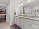 Stylish bathroom with double sinks and granite countertops at 517 Morrows Turnout Way, Pineville, NC 28134