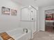 Elegant bathroom showcasing a soaking tub and modern glass shower at 517 Morrows Turnout Way, Pineville, NC 28134