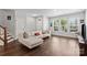 Bright living room with hardwood floors and natural light at 517 Morrows Turnout Way, Pineville, NC 28134