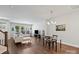 Modern living room with hardwood floors and natural light at 517 Morrows Turnout Way, Pineville, NC 28134