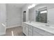 Modern bathroom featuring double sinks, a large mirror, a walk-in shower, and tile flooring at 5244 Admirals Lndg, Lancaster, SC 29720