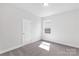 Comfortable bedroom featuring neutral carpet, a window, and ample natural light at 5244 Admirals Lndg, Lancaster, SC 29720