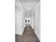 Bright hallway featuring elegant trim and beautiful flooring, creating a welcoming entrance at 5244 Admirals Lndg, Lancaster, SC 29720