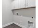 Functional laundry room with white cabinets and connections for washer and dryer at 5244 Admirals Lndg, Lancaster, SC 29720