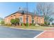 Classic red brick city hall building featuring symmetrical design, manicured landscaping and ample natural light at 531 Winding Way # 9, Belmont, NC 28012