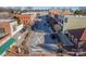 An eye-level captures a city street with thriving shops, street parking, and a well-maintained landscape in a beautiful town at 531 Winding Way # 9, Belmont, NC 28012