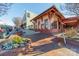 Street view showcases a charming brick building with red accents and brick sidewalk, surrounded by decorative landscaping at 531 Winding Way # 9, Belmont, NC 28012