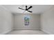 Clean bedroom with carpeted floors, a ceiling fan, and a window at 537 Riddle Mill Rd, Clover, SC 29710