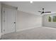Clean bedroom with carpeted floors, a ceiling fan, and a small window at 537 Riddle Mill Rd, Clover, SC 29710