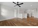 View of a bedroom with hardwood floors, a ceiling fan, and access to the hallway at 537 Riddle Mill Rd, Clover, SC 29710