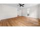 Open bedroom featuring hardwood floors and access to the ensuite bathroom at 537 Riddle Mill Rd, Clover, SC 29710