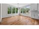 Bright dining area with hardwood floors and a view of the landscaped backyard at 537 Riddle Mill Rd, Clover, SC 29710