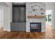 Stone fireplace with mantel and built-in cabinets adding charm and warmth to the living space at 537 Riddle Mill Rd, Clover, SC 29710
