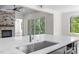 Close up of kitchen island with stainless steel sink and faucet at 537 Riddle Mill Rd, Clover, SC 29710