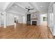 Spacious living room with hardwood floors, stone fireplace, and coffered ceilings at 537 Riddle Mill Rd, Clover, SC 29710