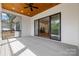 A covered patio with ceiling fan offers an extension of the home's living space at 537 Riddle Mill Rd, Clover, SC 29710