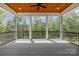 A covered patio with ceiling fan and wood ceiling provides an outdoor living space at 537 Riddle Mill Rd, Clover, SC 29710