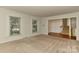 Bright living room featuring large windows for lots of natural light at 6117 Yellowood Rd, Charlotte, NC 28210
