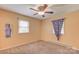 Well-lit carpeted bedroom with windows at 617 Oak Grove Rd, Kings Mountain, NC 28086