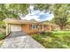 Charming brick home with a well-maintained lawn, covered parking and cozy front porch, offering curb appeal and comfort at 617 Oak Grove Rd, Kings Mountain, NC 28086