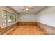 Bright room with laminate floors, wood paneling and natural light at 617 Oak Grove Rd, Kings Mountain, NC 28086