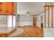 Open living space with wood floors, wallpaper and breakfast bar at 617 Oak Grove Rd, Kings Mountain, NC 28086