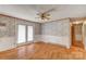Bright living space with laminate floors and white paneled walls at 617 Oak Grove Rd, Kings Mountain, NC 28086