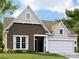 Charming one-story home featuring a 2-car garage, neutral color palette, and manicured lawn at 6352 Fairfax Ct, Maiden, NC 28650