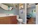 Charming bathroom with single vanity, round mirror, and nautical decor at 725 Chelton Ln, Fort Mill, SC 29715