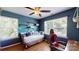 Modern bedroom with a daybed, hardwood floors, and natural light at 725 Chelton Ln, Fort Mill, SC 29715