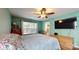 Serene bedroom with natural light, walk in bathroom, and a ceiling fan at 725 Chelton Ln, Fort Mill, SC 29715